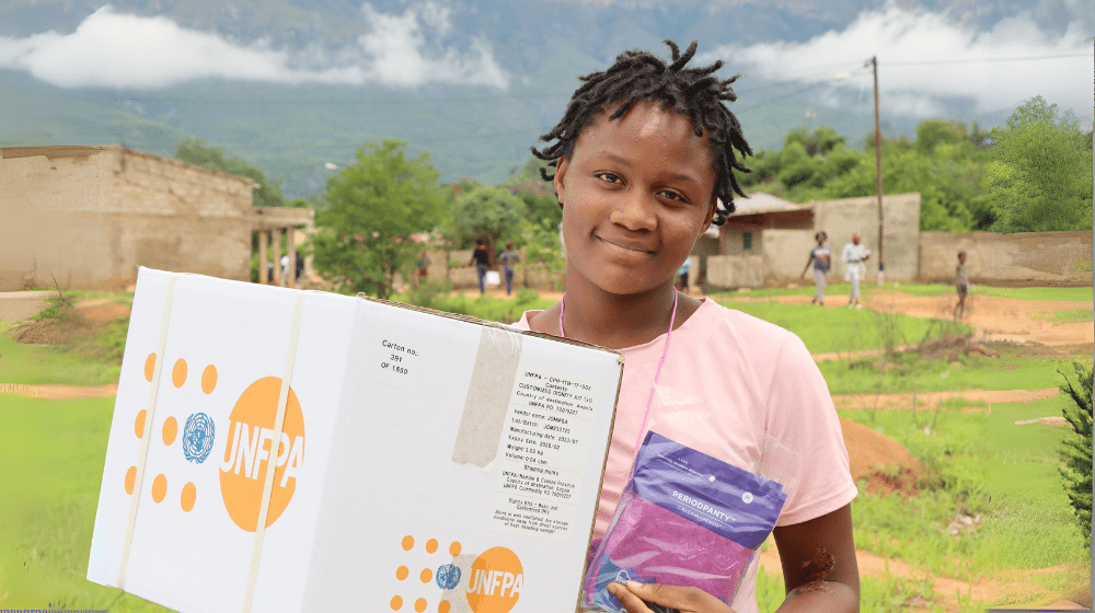 With a smile, Francisca shows off her dignity kit | ©UNFPA Angola/Dorivaldo Caetano